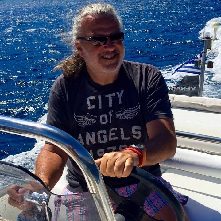 Best Rent a Boat Service in Milos Captain Riris - Owner of A La Mer Private Boat Tours in Milos, Cyclades Greece