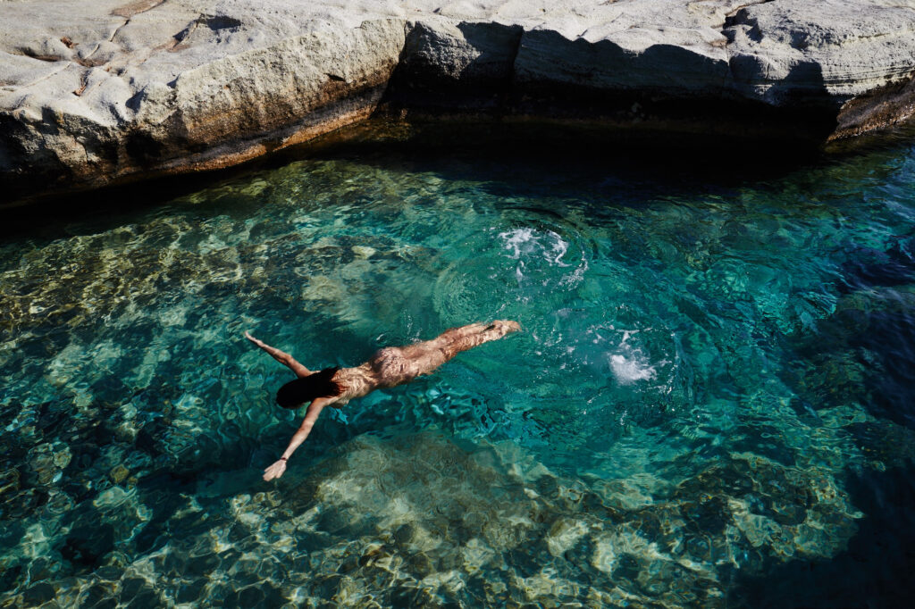 Swimming in kleftiko beach in Milos Greece